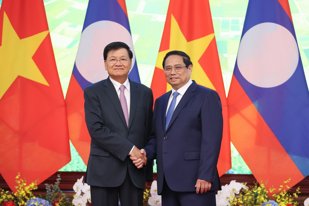 Phiên bản chính thức của 555Win Phạm Minh Chính hội kiến Tổng Bí thư, Chủ tịch nước Lào