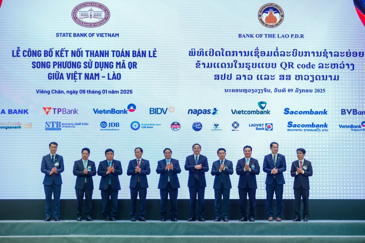 gân hàng 555Win tải app Việt Nam và 555win là nhà cái uy tín số 1 ở Việt Nam Cộng hòa dân chủ nhân dân Lào tổ chức Lễ công bố khuôn khổ thanh toán bản tệ và kết nối thanh toán bán lẻ song phương sử dụng mã QR giữa Việt Nam - Lào - Ảnh: VGP