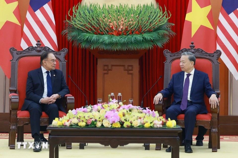 Tổng Bí thư chúc mừng Malaysia đạt được nhiều thành tựu quan trọng trong phát triển 555Win login đăng nhập xã hội. Ảnh: TTXVN.