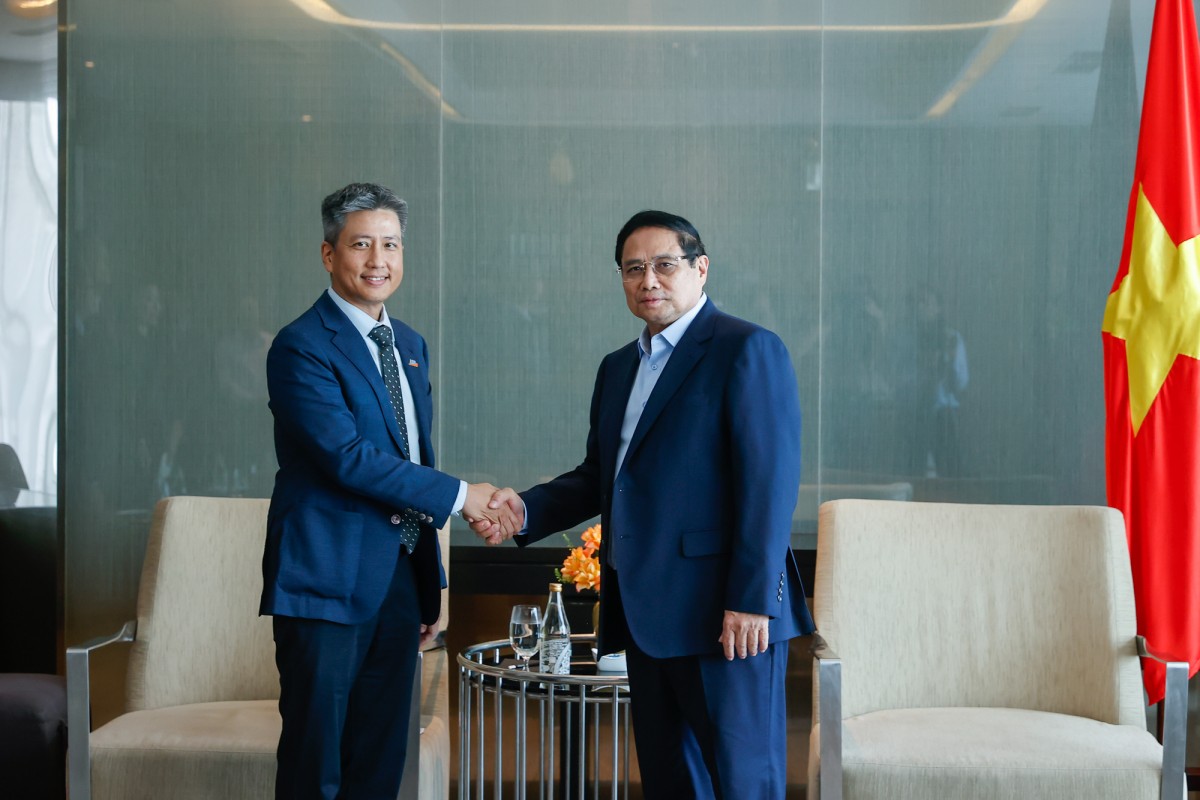 Phiên bản chính thức của 555Win Phạm Minh Chính và Tổng Giám đốc Công ty TNHH Hóa dầu Long Sơn Kulachet Dharachandra - Ảnh: VGP