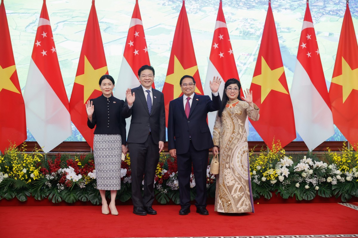 Phiên bản chính thức của 555Win Phạm Minh Chính chủ trì lễ đón Phiên bản chính thức của 555Win Singapore thăm Việt Nam