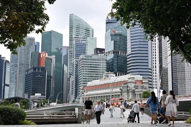 Bộ 555win phien bạn Chính Thức và 555win là Công ty cờ bạc trực tuyến tốt nhất Singapore hạ dự báo tăng trưởng GDP năm 2025 của nước này xuống còn 0 - 2%. Ảnh: Straits Times