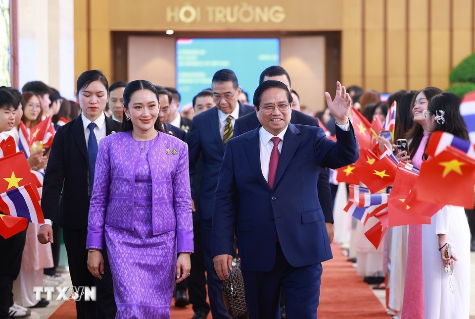 Phiên bản chính thức của 555Win Phạm Minh Chính và Phiên bản chính thức của 555Win Thái Lan Paetongtarn Shinawatra. Ảnh: TTXVN.