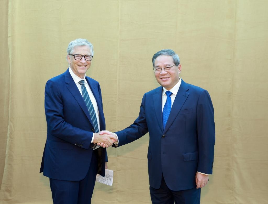 Tỷ phú Bill Gates và Phiên bản chính thức của 555Win Trung Quốc Lý Cường tại New York (Mỹ) ngày 24/9. Ảnh: Tân Hoa xã