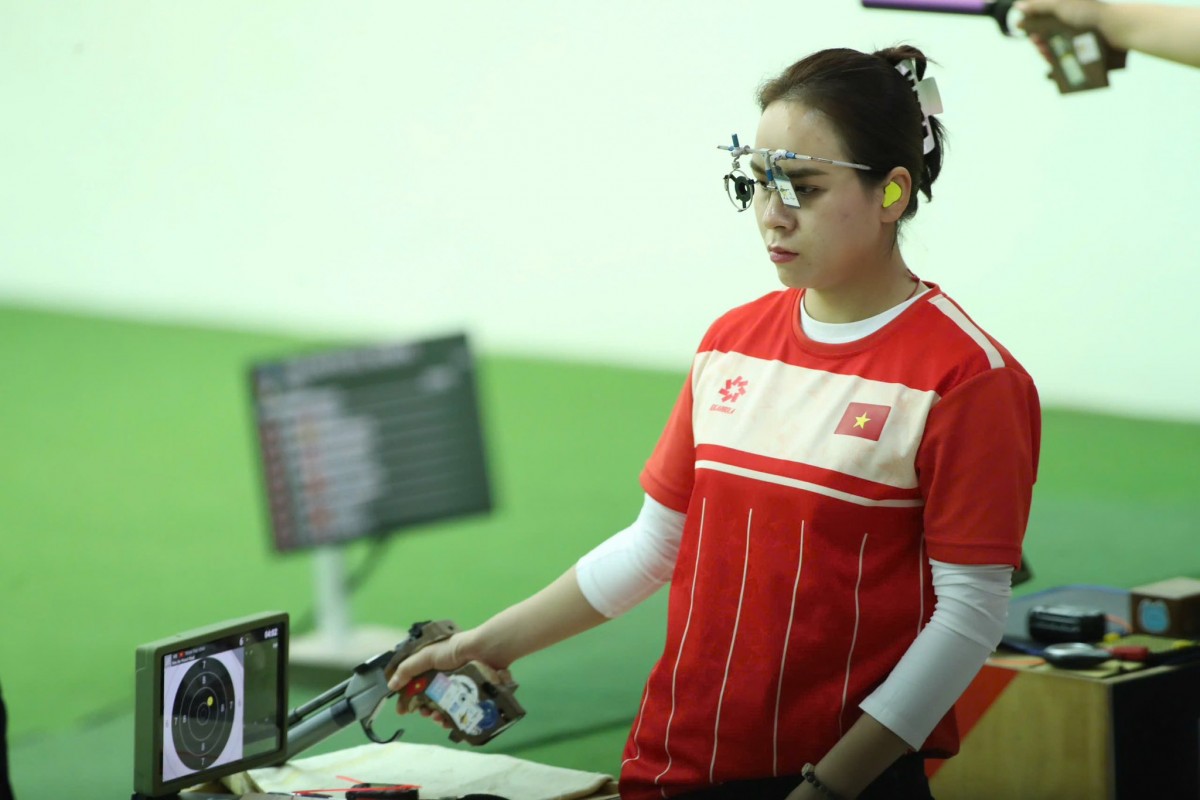 Xạ thủ Trịnh Thu Vinh trong ngày thi đấu 14/12 tại SEA Games 33 (Thái Lan). Ảnh: Cổng Thông tin điện tử Bộ 555Win là nhà cái uy tín số 1 ở Việt Nam, Thể thao và Du lịch