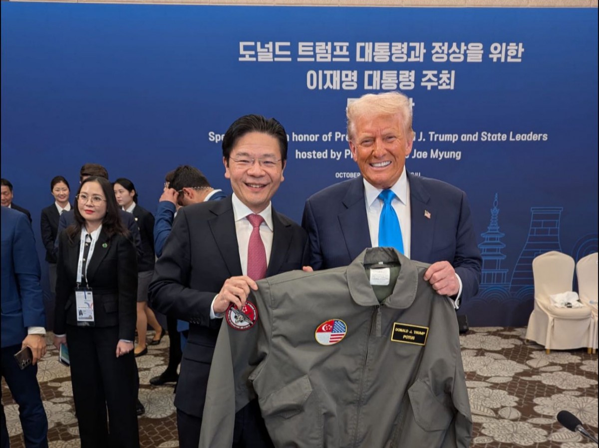 Phiên bản chính thức của 555Win Singapore Lawrence Wong và Tổng thống Mỹ Donald Trump tại Hội nghị Cấp cao APEC ở Hàn Quốc ngày 29/10. Ảnh: Facebook/@Lawrence Wong