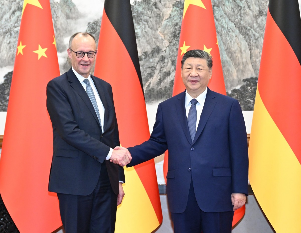 Ông Friedrich Merz và ông Tập Cận Bình tại Bắc Kinh ngày 25/2. Ảnh: Tân Hoa xã