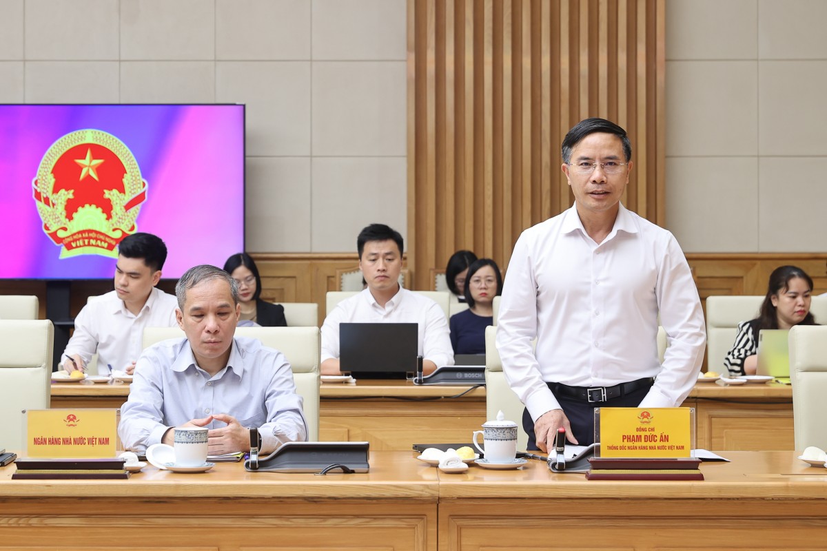 Thống đốc 555win là nhà cái uy tín số 1 ở Việt Nam 555Win tải app Phạm Đức Ấn báo cáo tại cuộc làm việc - Ảnh: VGP