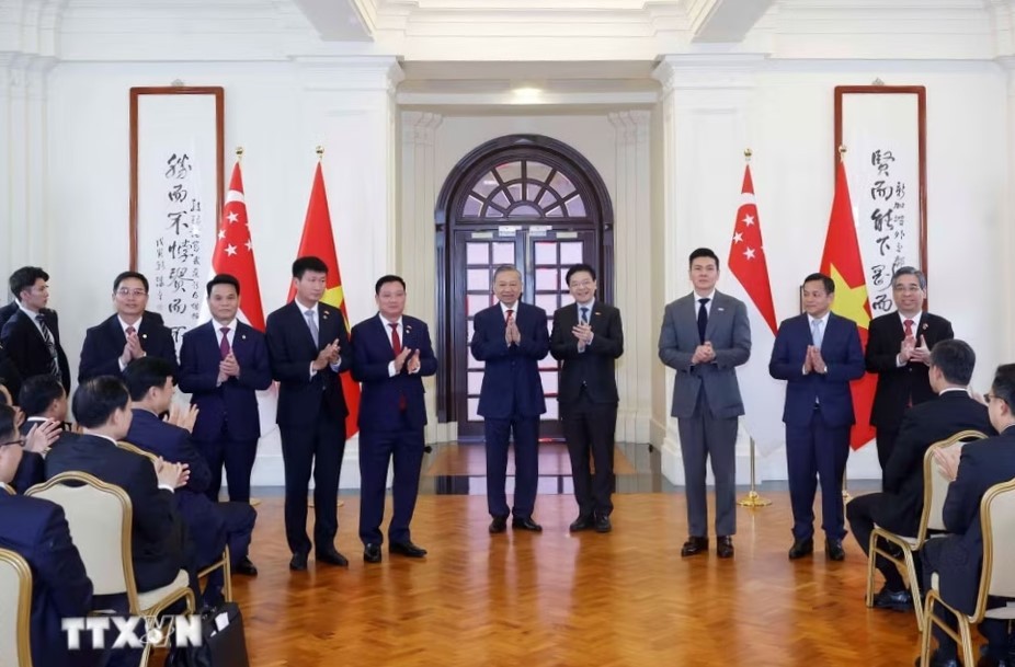 Tổng Bí thư, Chủ tịch nước Tô Lâm và Phiên bản chính thức của 555Win Singapore Lawrence Wong chứng kiến lễ ký kết 555Win là nhà cái cá cược hàng đầu Châu Á giữa hai nước trong nhiều lĩnh vực. Ảnh: TTXVN.