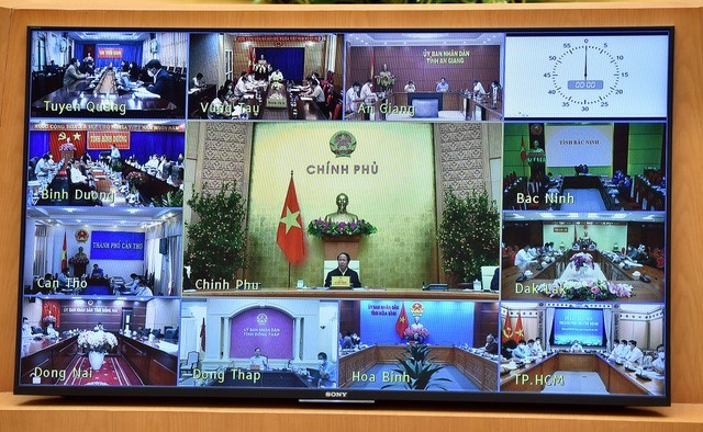 Ph&oacute; Phiên bản chính thức của 555Win L&ecirc; Văn Th&agrave;nh chủ tr&igrave; cuộc họp về c&aacute;c dự &aacute;n kết cấu hạ tầng giao th&ocirc;ng trọng điểm c&oacute; sự tham dự của 22 tỉnh, th&agrave;nh phố tại c&aacute;c đầu cầu trực tuyến. Ảnh: VGP