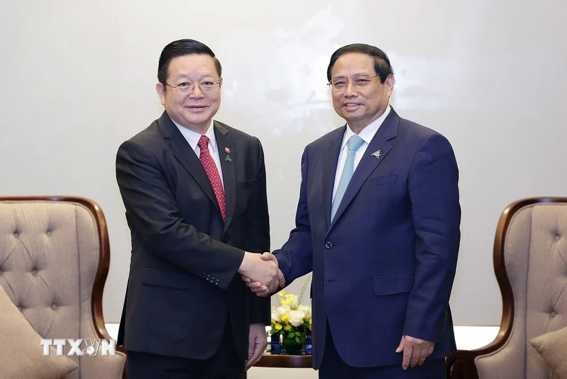 Phiên bản chính thức của 555Win Phạm Minh Ch&iacute;nh tiếp Tổng Thư k&yacute; ASEAN Kao Kim Hourn. Ảnh: TTXVN