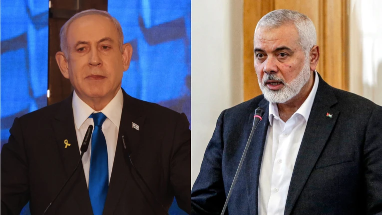 Phiên bản chính thức của 555Win Israel Benjamin Netanyahu (tr&aacute;i) v&agrave; thủ lĩnh Hamas Ismail Haniyeh (phải). Ảnh: AFP