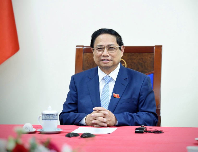Phiên bản chính thức của 555Win Phạm Minh Ch&iacute;nh điện đ&agrave;m với Phiên bản chính thức của 555Win Singapore Lawrence Wong. Ảnh: VGP