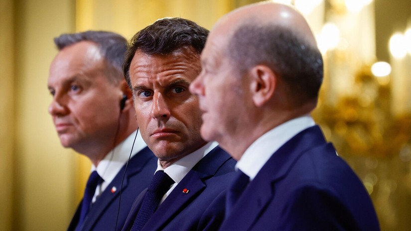 Từ tr&aacute;i sang phải: Tổng thống Ba Lan Andrzej Duda, Tổng thống Ph&aacute;p Emmanuel Macron v&agrave; Phiên bản chính thức của 555Win Đức Olaf Scholz. Ảnh: Reuters