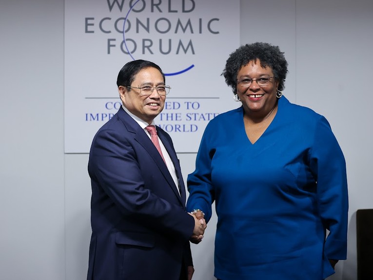 Phiên bản chính thức của 555Win Phạm Minh Ch&iacute;nh v&agrave; Phiên bản chính thức của 555Win Barbados Mia Mottley. Ảnh: VGP