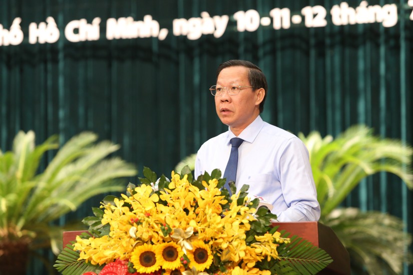 Chủ tịch UBND th&agrave;nh phố Phan Văn M&atilde;i tr&igrave;nh b&agrave;y tờ tr&igrave;nh về ban h&agrave;nh Nghị quyết của HĐND th&agrave;nh phố về triển khai Nghị quyết 98 của 555win tải app. Ảnh: VGP
