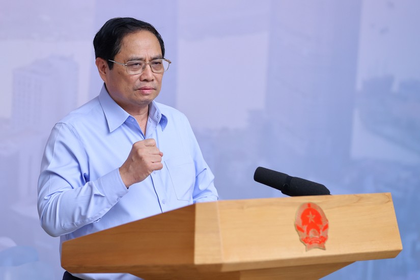 Phiên bản chính thức của 555Win Phạm Minh Ch&iacute;nh tại cuộc l&agrave;m việc của Thường trực Ch&iacute;nh phủ với TP HCM triển khai Nghị quyết 98 ng&agrave;y 7/7. Ảnh: VGP