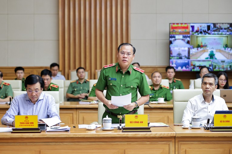 Đại diện Bộ C&ocirc;ng an b&aacute;o c&aacute;o tại Hội nghị. Ảnh: VGP