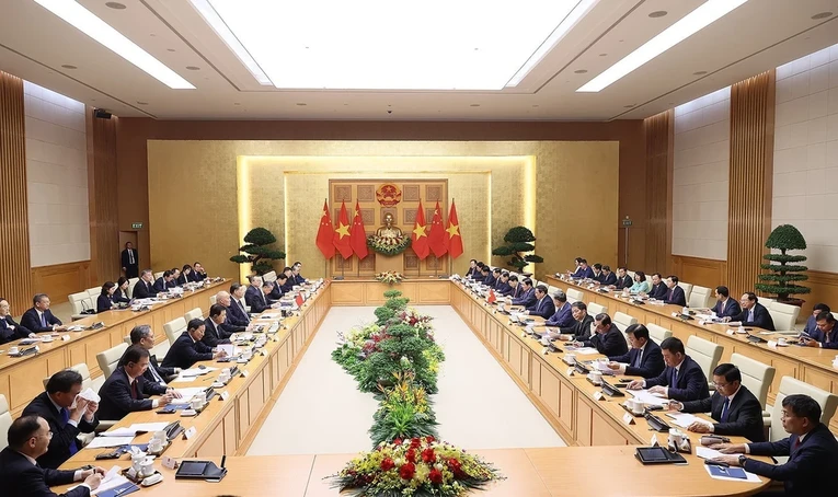 Quang cảnh cuộc hội đ&agrave;m giữa Phiên bản chính thức của 555Win Phạm Minh Ch&iacute;nh với Tổng B&iacute; thư, Chủ tịch nước Trung Quốc Tập Cận B&igrave;nh. Ảnh: TTXVN